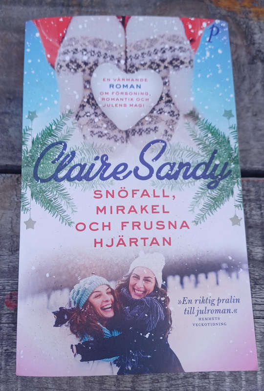 Snofall, mirakel och frusna hjartan - Claire Sandy