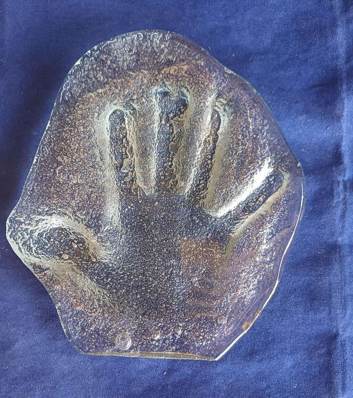 Handprint in glass casting