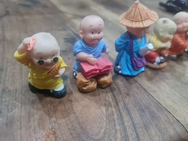 Buddhist Monk Figurines,  vintage and highly collectable