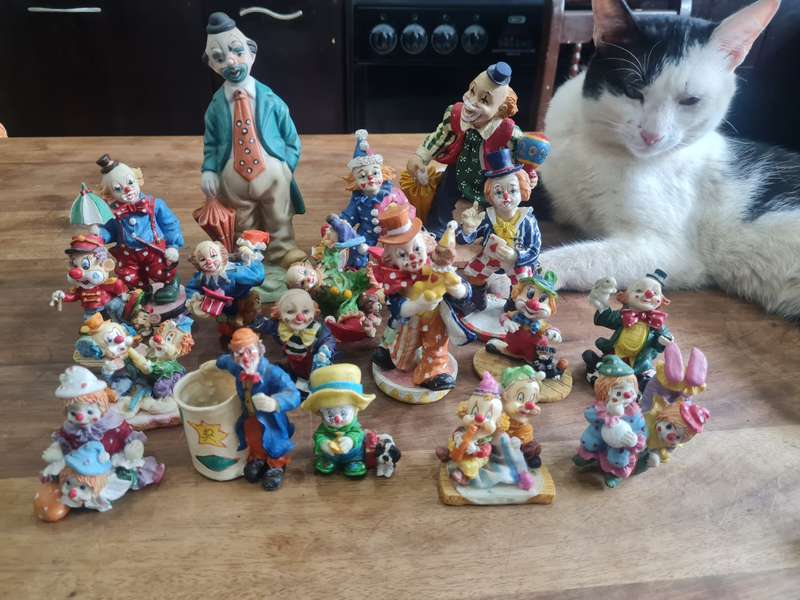 Collection of 18 porcelain clowns