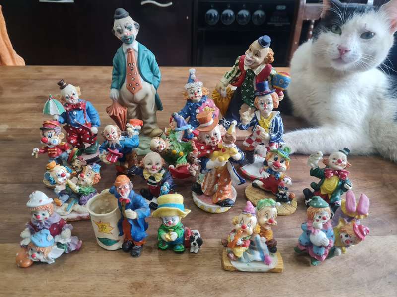 Collection of 18 porcelain clowns