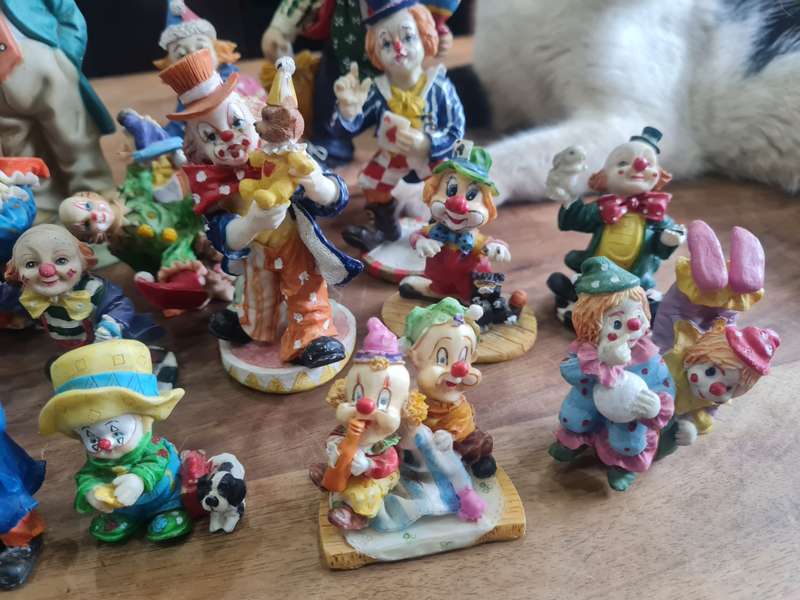 Collection of 18 porcelain clowns