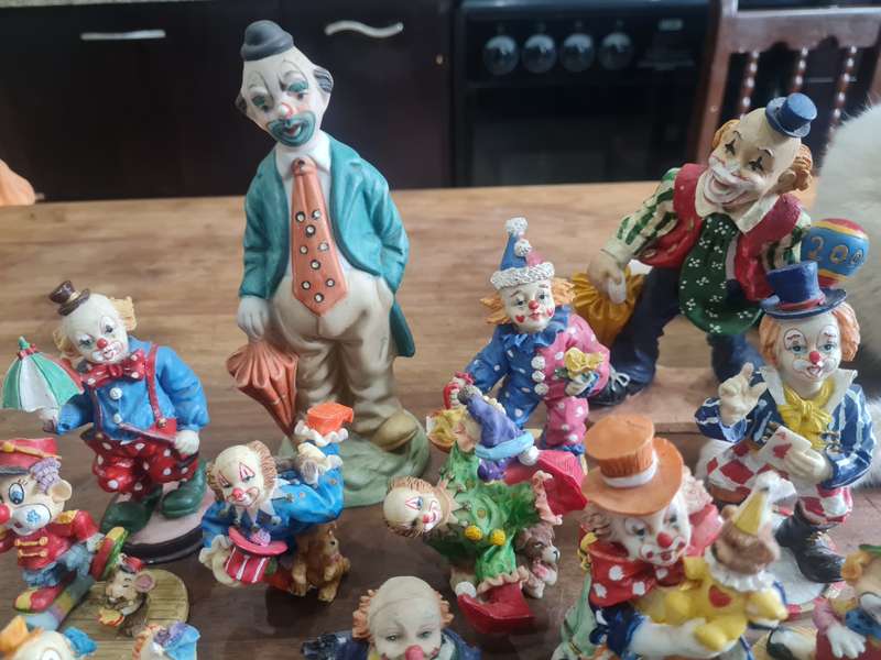 Collection of 18 porcelain clowns