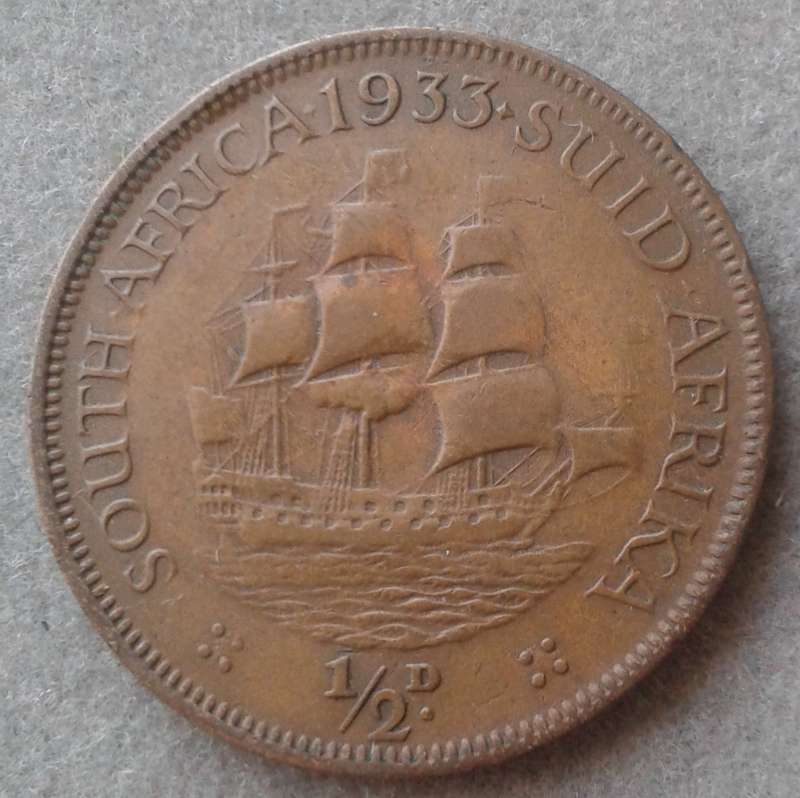 Lower mintage 1933 Union 1/2 penny with obverse struck through error