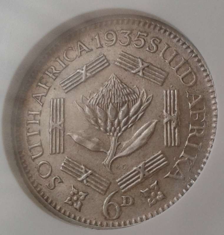 High grade 1935 union silver sixpence NGC AU58