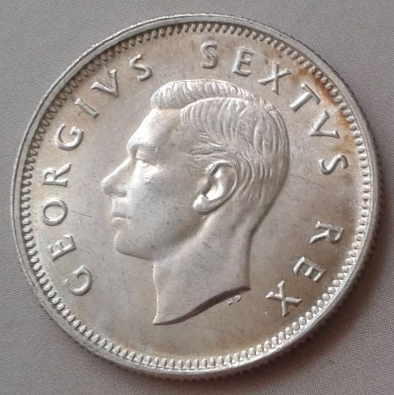 1950 Union silver shilling in lustrous high grade