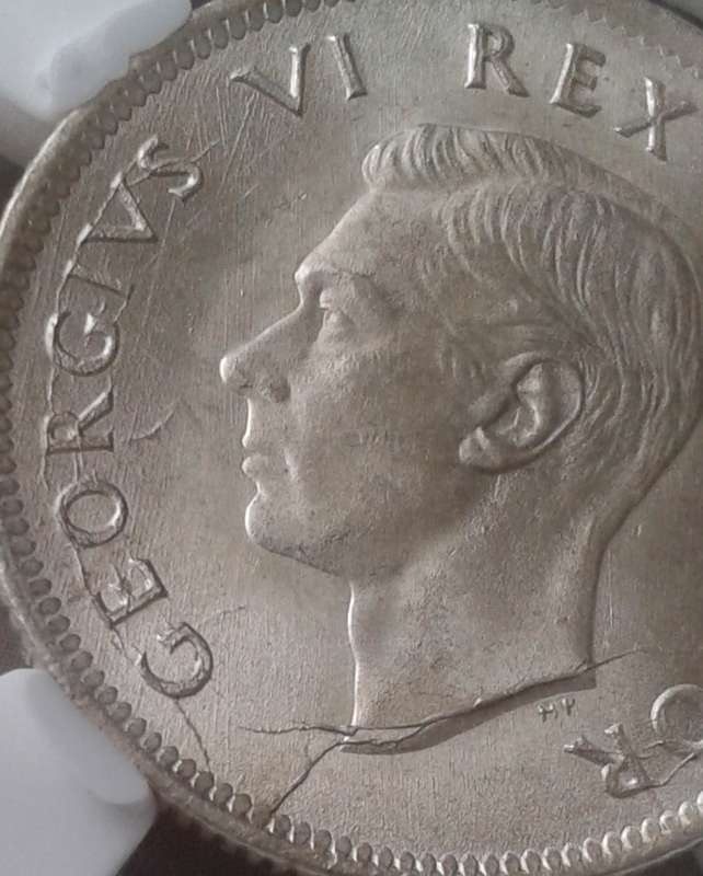 Nice 1942 union silver shilling SANGS MS63 (Cracked Die)