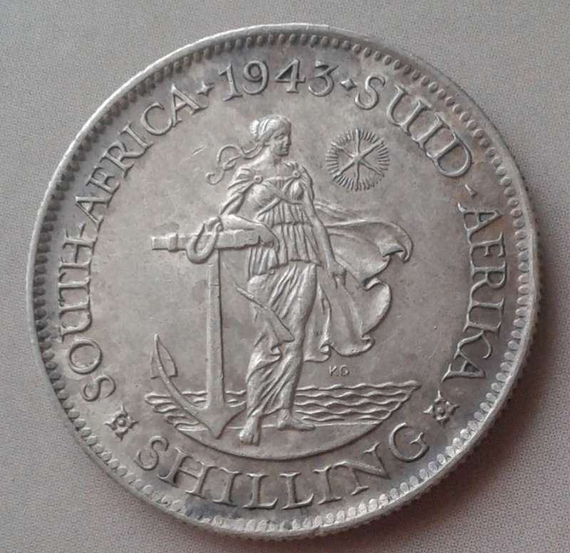 Nice 1943 union silver shilling in higher grade