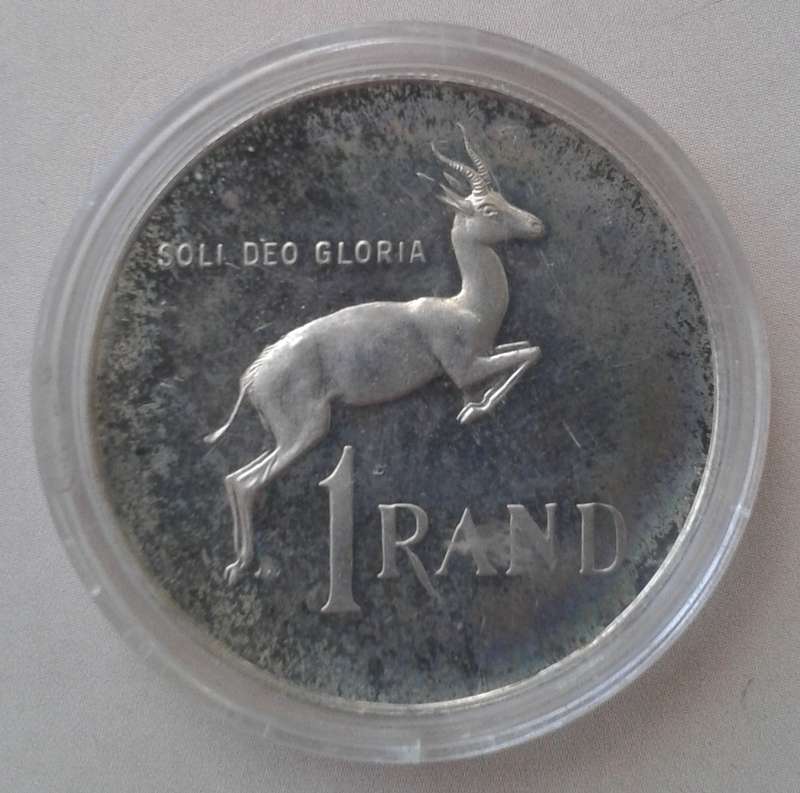 Encapsulated 1980 proof silver R1 (mintage: 15000)