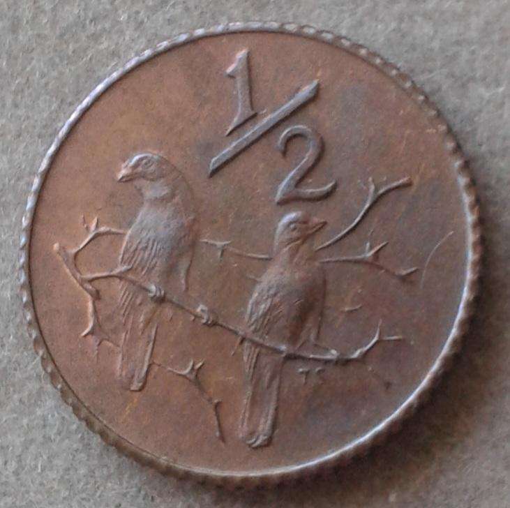 Scarcer 1977 uncirculated 1/2c (mintage: 20000).