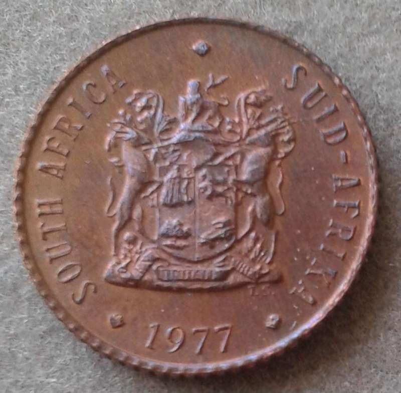 Scarcer 1977 uncirculated 1/2c (mintage: 20000).