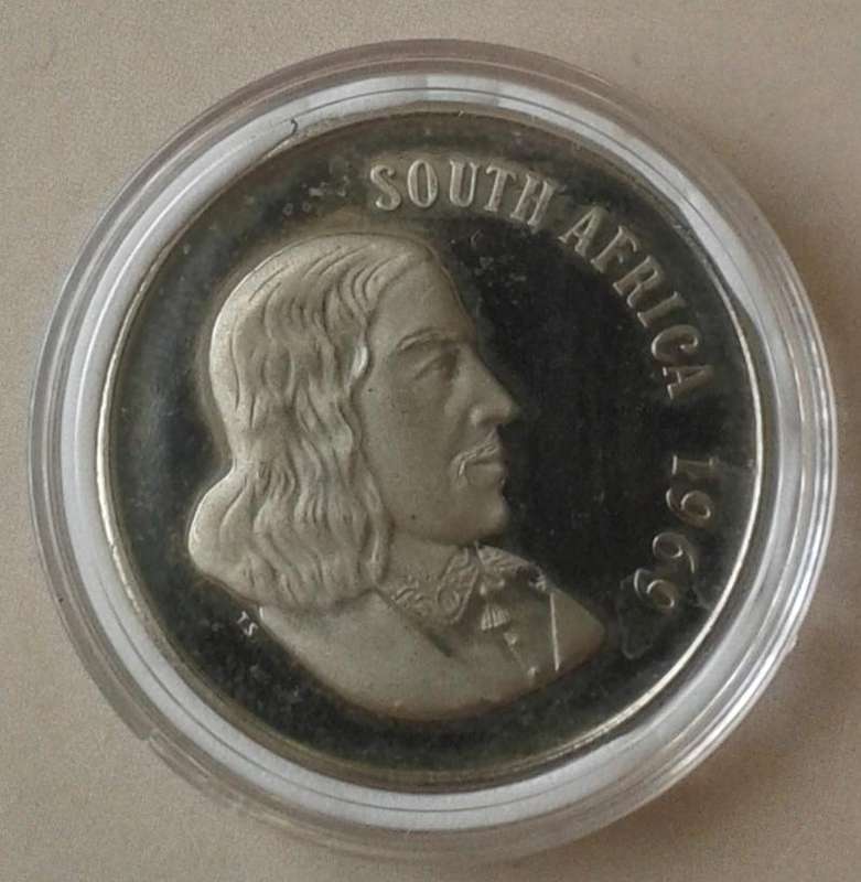 Encapsulated 1969 English proof 50c (mintage: 12000)
