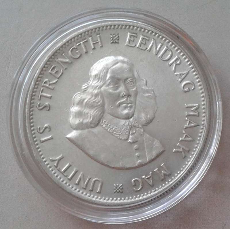 Encapsulated 1962 silver 20c