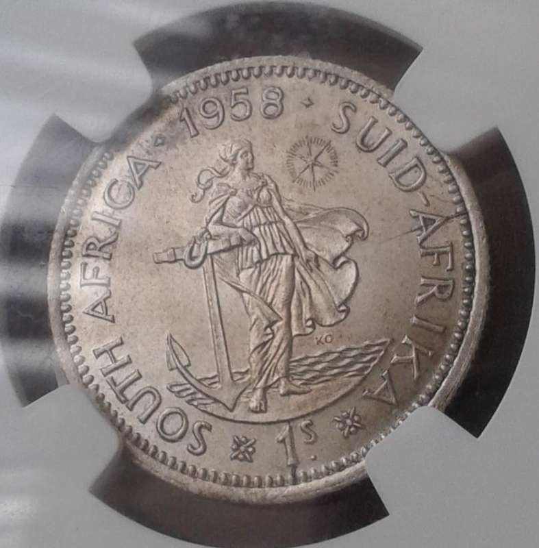 1958 Union silver shilling NGC MS61 with reverse die crack