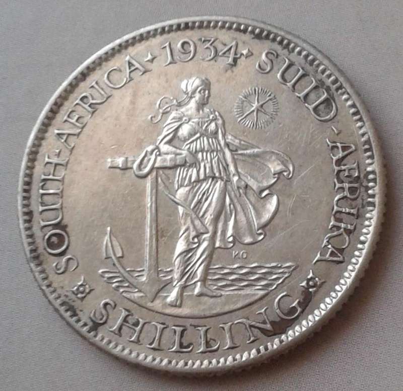 1934 Union silver shilling with AU Details