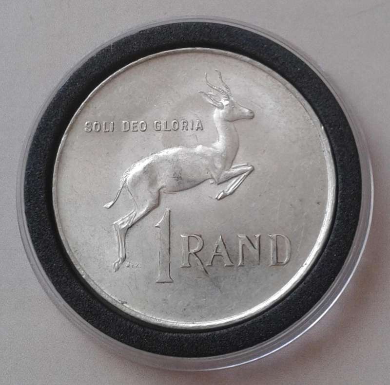 Encapsulated 1966 Republic silver R1 "Tagged Ear".