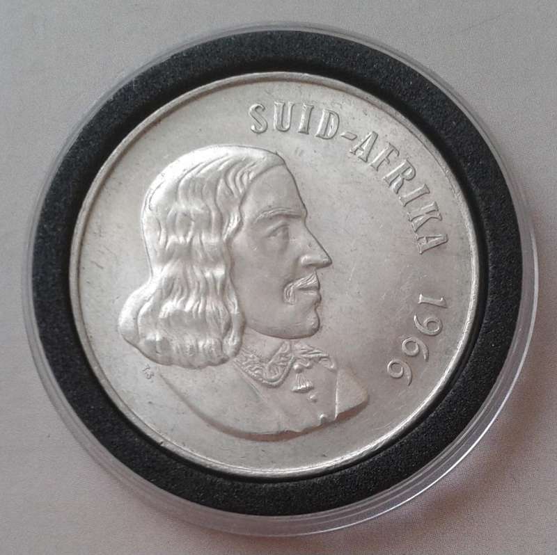 Encapsulated 1966 Republic silver R1 "Tagged Ear".