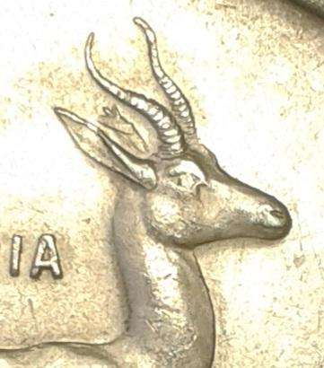 Encapsulated 1966 Republic silver R1 "Tagged Ear".