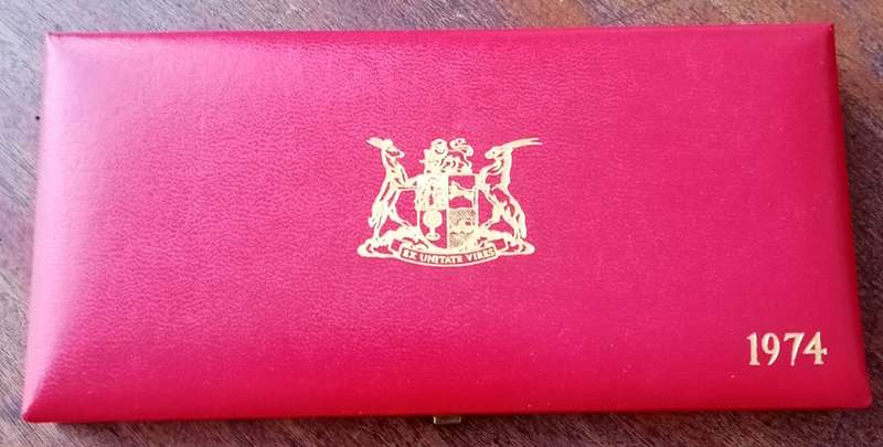 Partial 1974 proof set in red box (50c-1/2c).