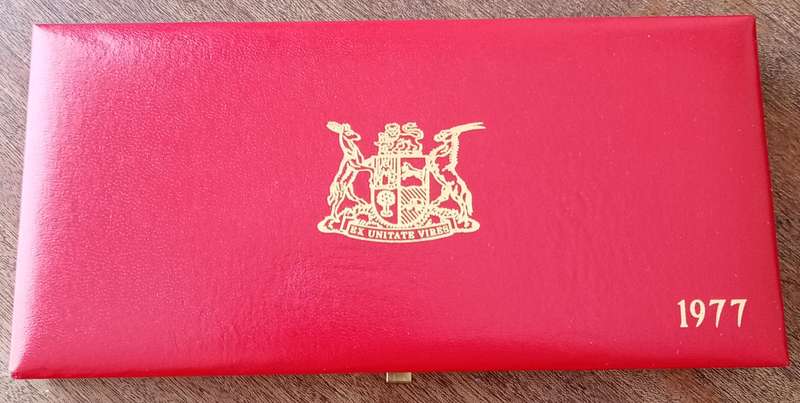 Partial 1977 proof set in red box (50c-1/2c).