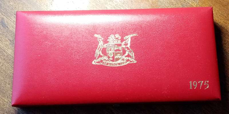 Partial 1975 proof set in red box (50c-1/2c)