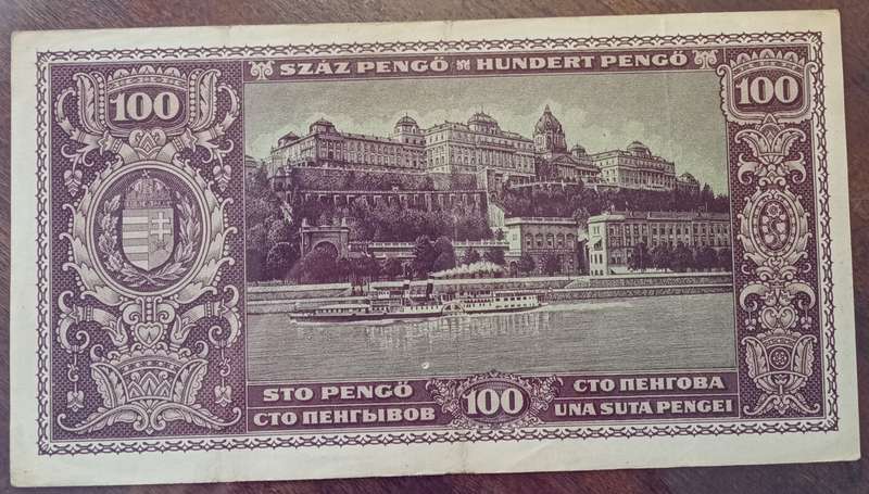 1945 WW2 Hungary 100 Pengő note in hard plastic sleeve