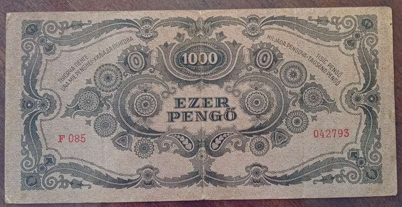 1945 WW2 Hungary 1000 Pengő note in hard plastic sleeve