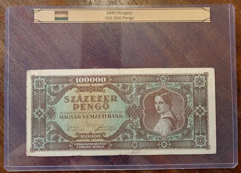 1945 Hungary 100000 Pengő note in hard plastic sleeve
