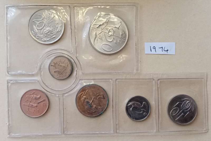 Partial 1974 uncirculated Mint pack (50c-1/2c) with scarcer 1/2c