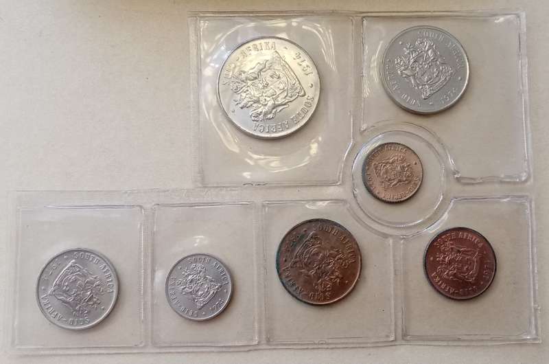 Partial 1974 uncirculated Mint pack (50c-1/2c) with scarcer 1/2c