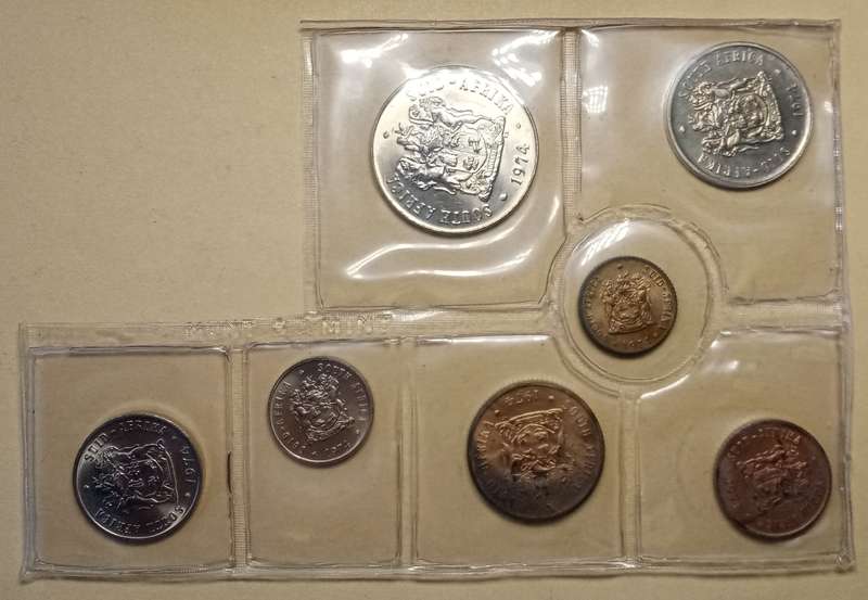 Partial 1974 uncirculated Mint pack set (50c-1/2c) with scarcer 1/2c.