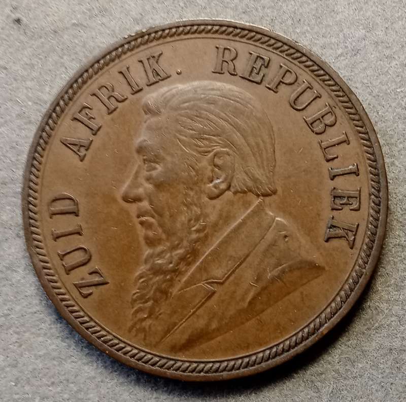 1894 ZAR Kruger penny in AU (low mintage).