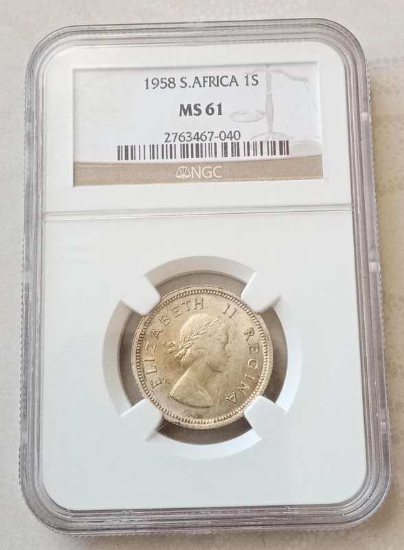 1958 Union silver shilling NGC MS61 with reverse die crack