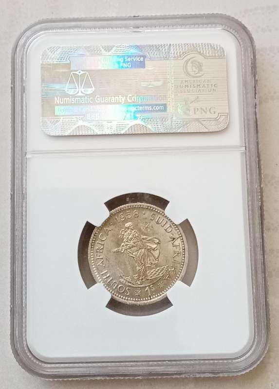 1958 Union silver shilling NGC MS61 with reverse die crack