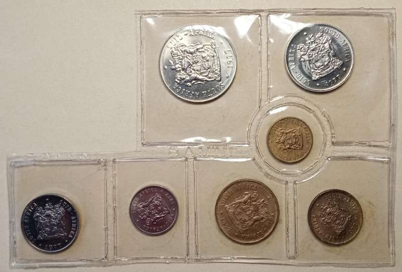 Partial 1977 uncirculated Mint pack (50c-1/2c) with scarcer 1/2c