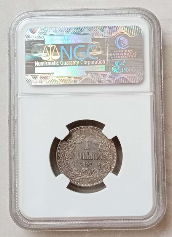 Higer grade 1897 ZAR Kruger silver shilling NGC AU55