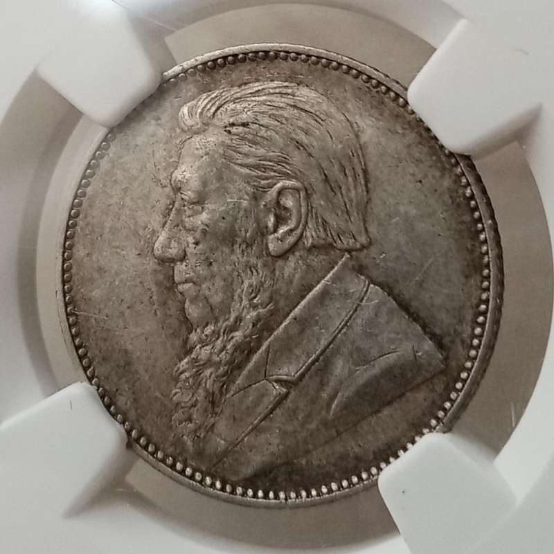 Higer grade 1897 ZAR Kruger silver shilling NGC AU55