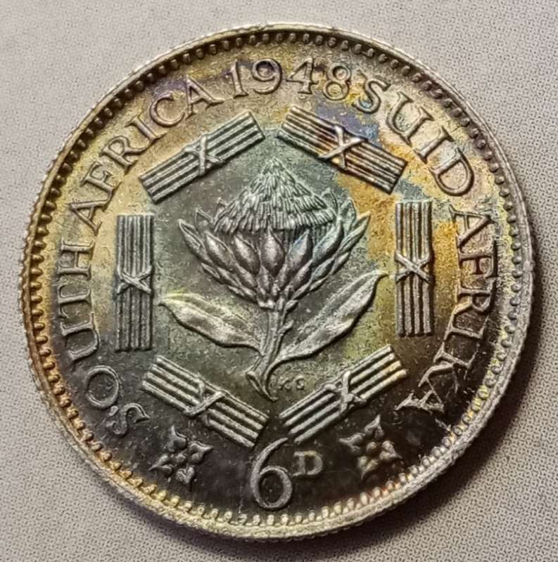 1948 Union silver sixpence in top grade with great toning