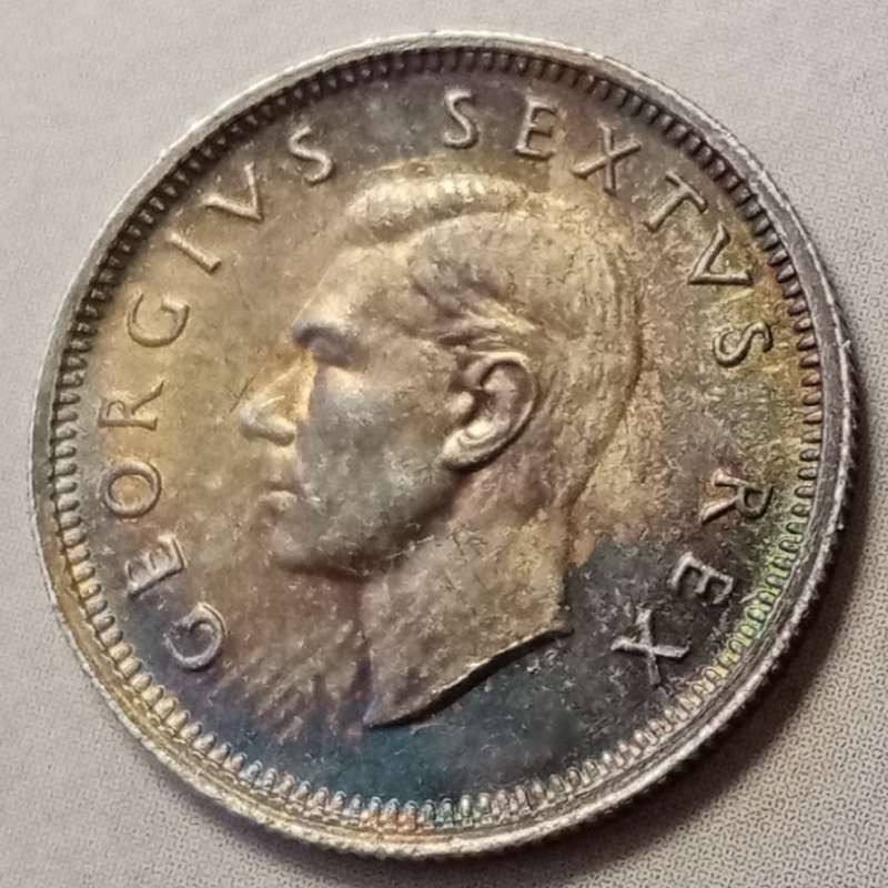 1948 Union silver sixpence in top grade with great toning