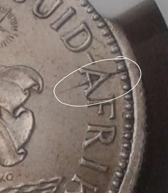 1958 Union silver shilling NGC MS61 with reverse die crack