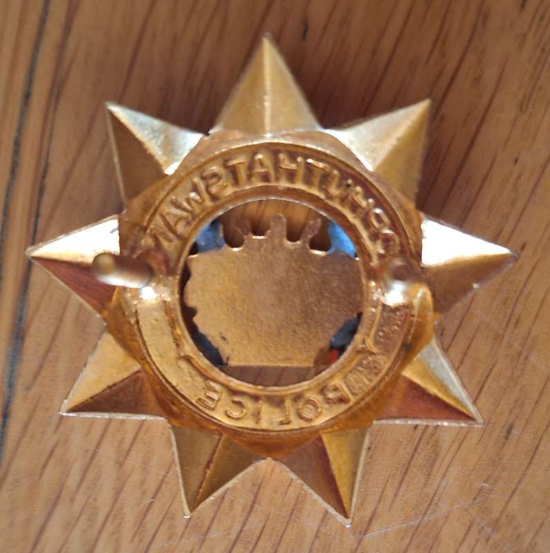BOPHUTHATSWANA POLICE  CAP BADGE -   SCREWS INTACT