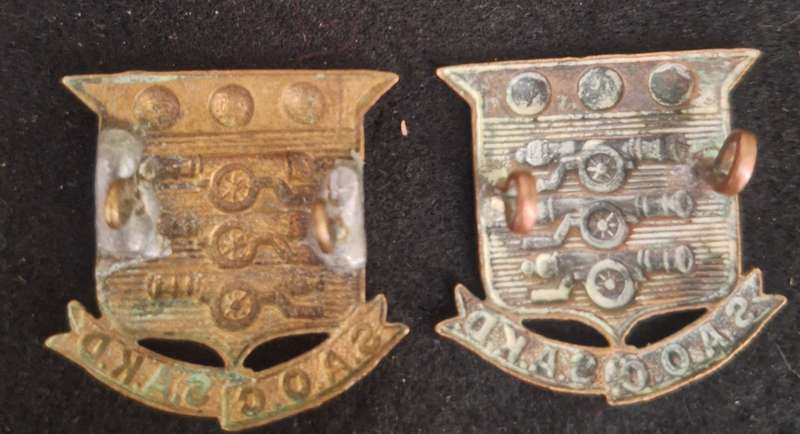 WW2 - SA ORDNANCE CORPS COLLAR BADGES - LUGS ON 1 BADGE IS REPAIRED