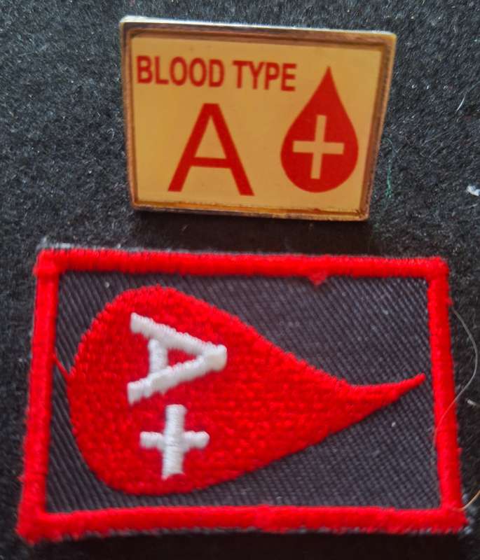 UNKNOWN ORIGIN BLOOD TYPE BADGES - 1 X METAL & 1 X CLOTH