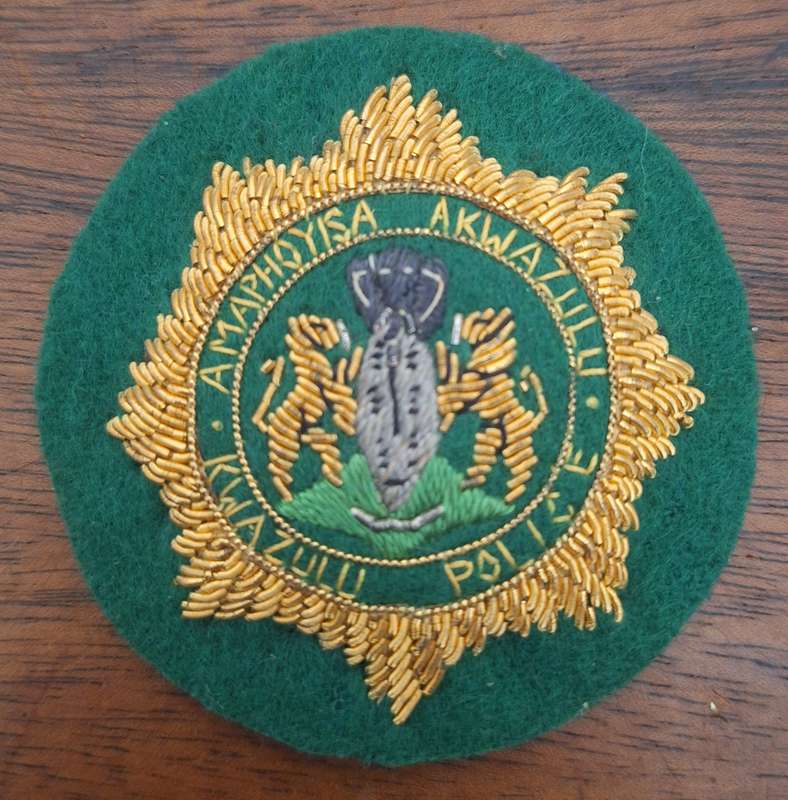 EX HOMELAND - KWAZULU POLICE OFFICERS CAP BADGE - BULLION WIRE