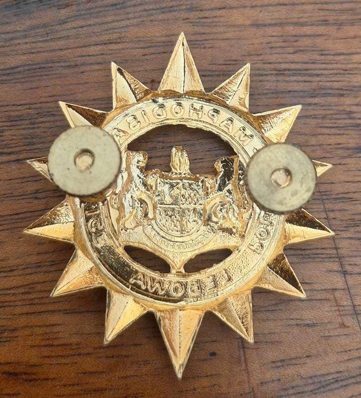 EX HOMELAND - LEBOWA POLICE GILDING CAP BADGE - SCREWS INTACT