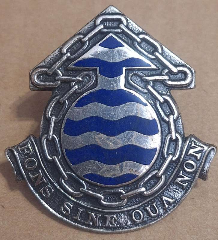 SADF - ORDNANCE SERVICES CAP BADGE - SCREWS INTACT.