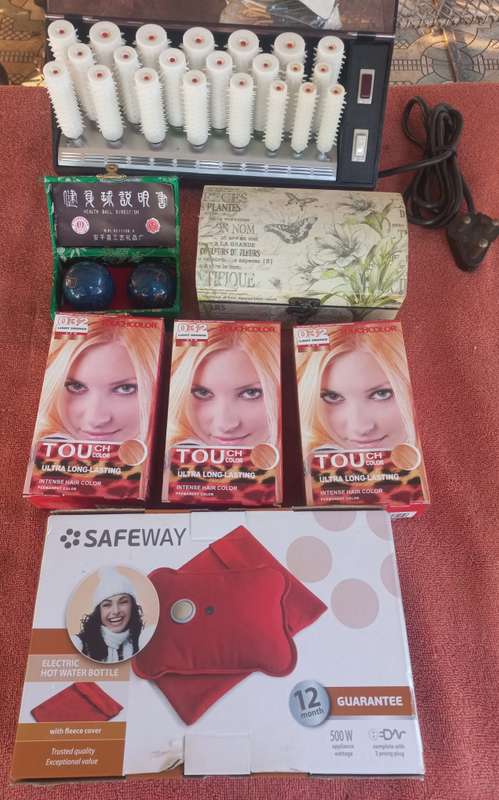Lot of warm curlers (Carmen 22), hair dye, electric water bottle, heath balls, & jewelry box