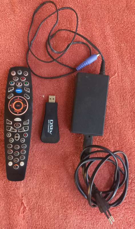 DSTV remote, power supply & wifi usb connector stick - 1 bid for the lot