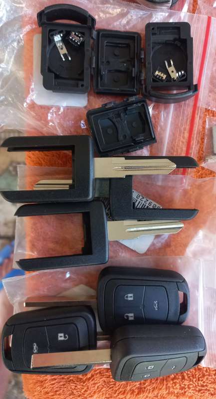 Lot of key-blanks and car key-remote covers - see photos and description