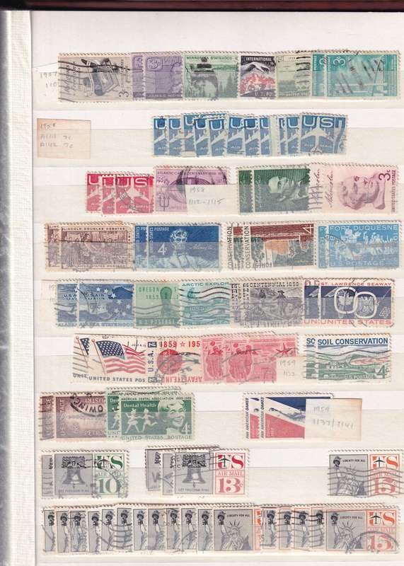 Ideal brown 17 page album filled with assortment of USA stamps , M/H & used        (14 SCANS)
